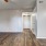 a kitchen with a wood floor