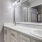 a bathroom with a large mirror